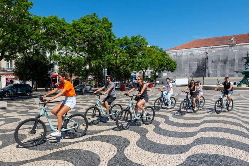 Lisbon: Bike Tour from Lisbon to Belém + Liquor & Pastry - The relaxed river ride through Doca de Santo Amaro