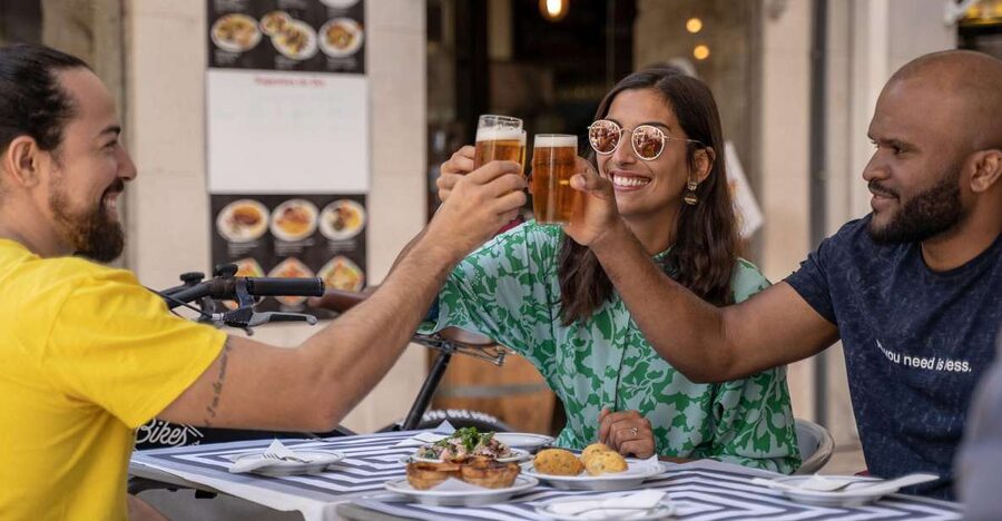 Lisbon: E-Bike Food Tour of Alfama and Old Town - Alfama: lanes, tiled walls, and the first tasting