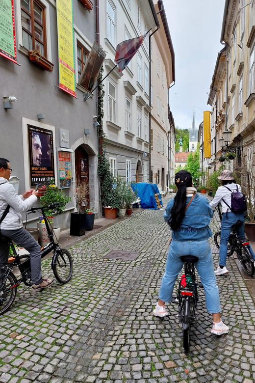 Ljubljana by E-Bike: Guided City Highlights Tour - Riding toward Ljubljana Castle