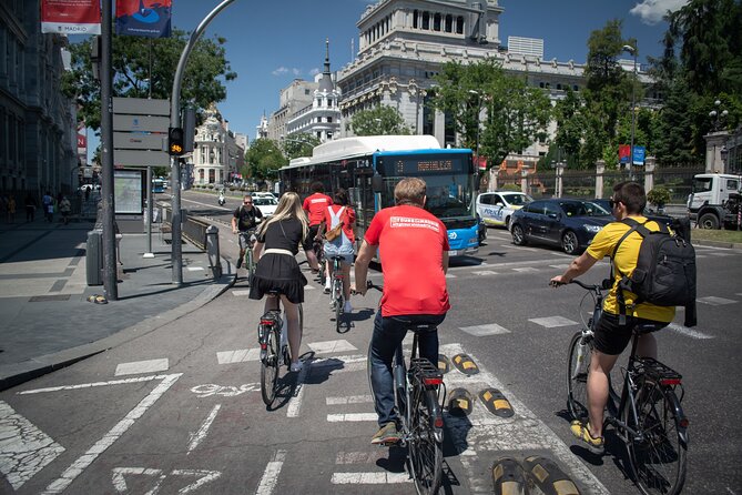 Madrid: 3 hour Guided Highlights Bike Tour with Optional Tapas - Riding through 130 hectares of Retiro Park