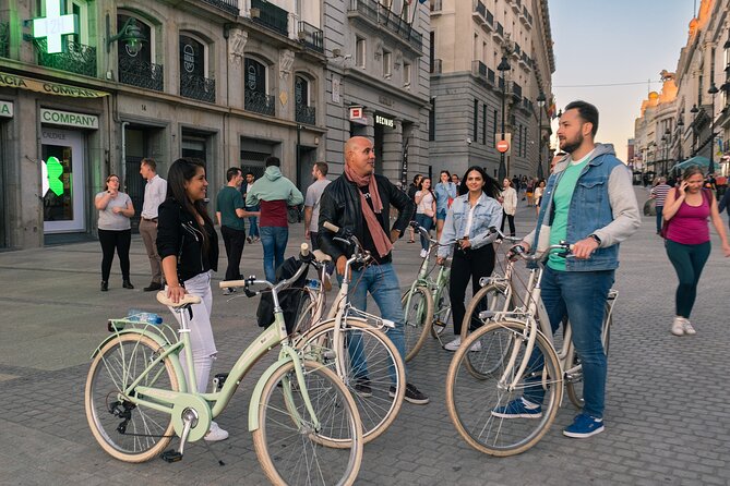 Madrid at Night: Vintage Bike Tour of City Highlights - Gran Vía under the lamps