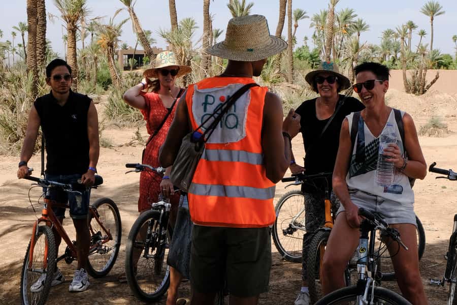 Marrakech: Cycling Tour in Palm Groove with Local Breakfast - Meeting Moroccan tile makers