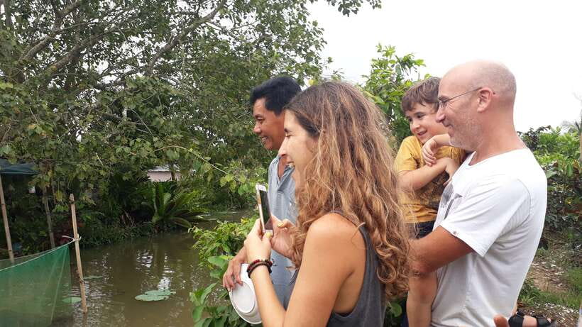 Mekong Day Tour by Car:Cai Be market, Local Island & Cycling - Lunch in a garden house around noon