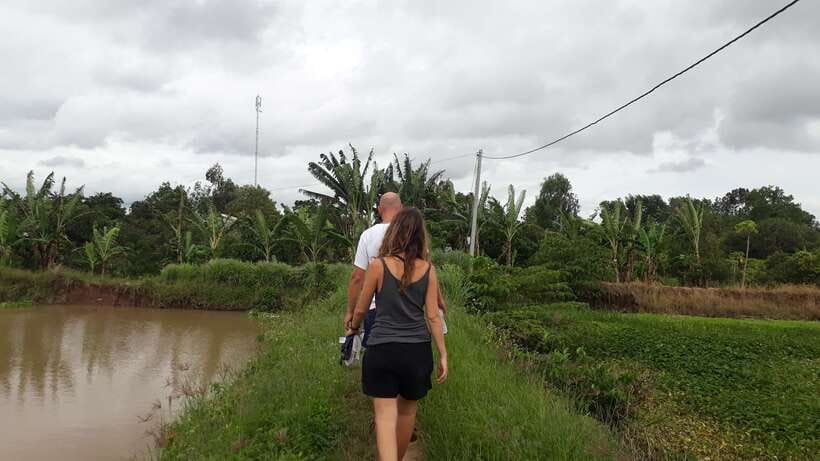 Mekong Day Tour by Car:Cai Be market, Local Island & Cycling - A village walk or cycling ride after lunch