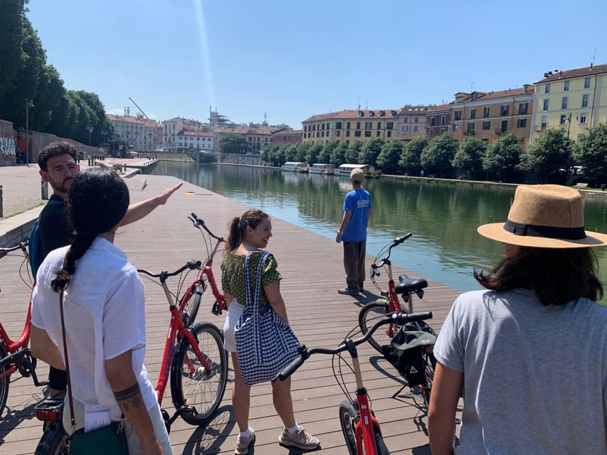 Milan: City Highlights Bike Tour - Arco della Pace and Sempione Park slow the ride down