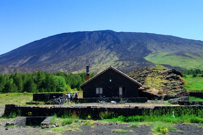 Mountain Biking Etna by MTB or E-Bike - Descending sandy roads through woods and lava flows