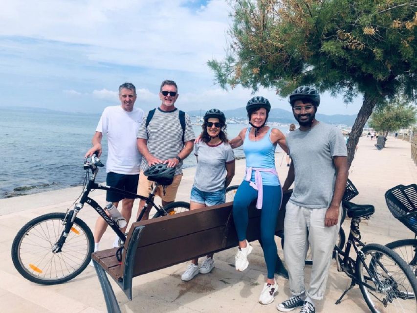 Palma de Mallorca: Guided Bicycle Tour with Tapas & a Drink - A closer look at La Lonja and the old quarters
