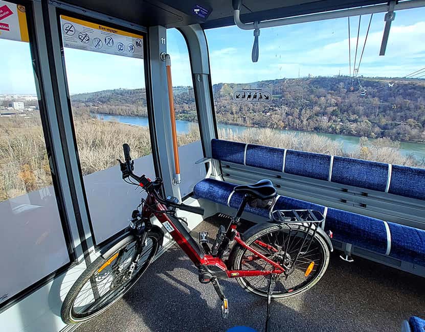 Panoramic Toulouse, e-bike ride, and cable car - Crossing to Ramier Island on suspended walkways