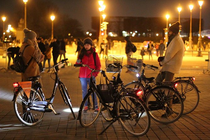 Paris By Night: 3-Hour Guided Bike Tour - Starting near the Opera and getting ready to ride