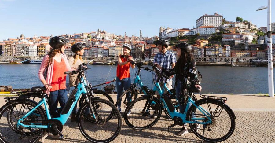 Porto: Riverside Panoramic E-Bike Tour - Ribeira Square: Porto’s riverfront opening scene