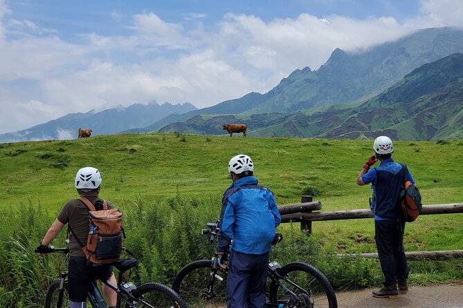 Private E-MTB guided cycling around Mt. Aso volcano & grasslands - Kusa no Michi and the open Millennium Grassland