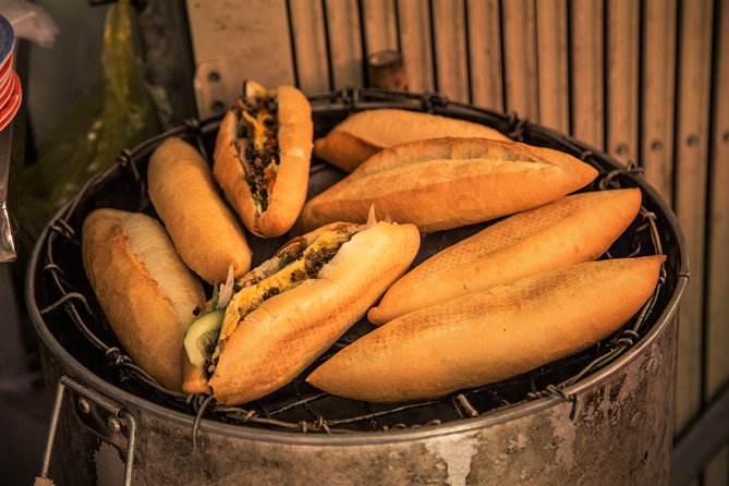 Private Hoi An Evening Food Tastings Tour by Bike - Crossing to Cam Nam Island for banh xeo