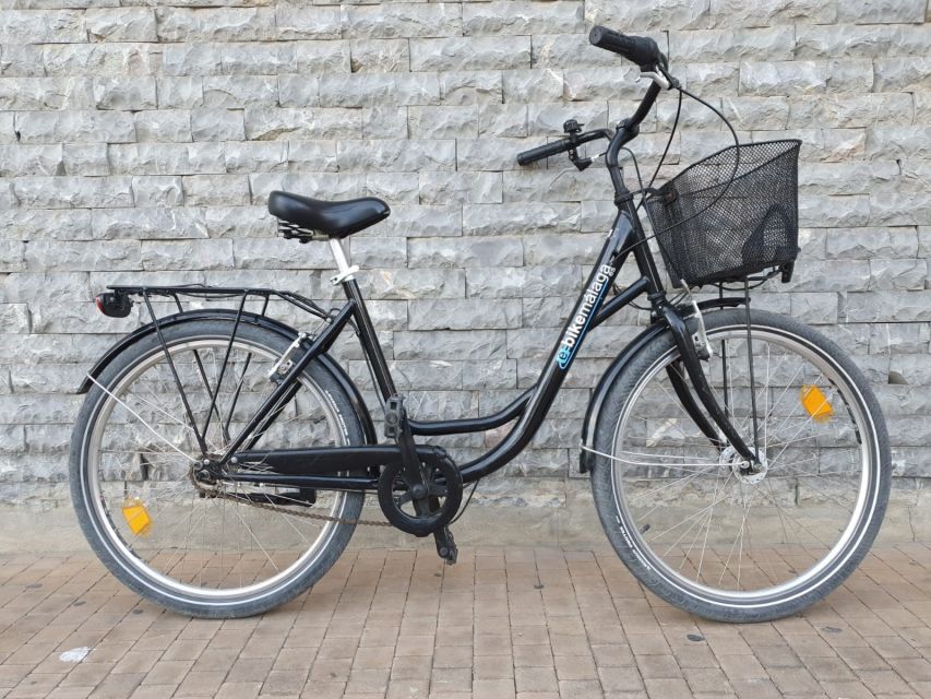 Rent a bike in Malaga - Family riding with baby seats