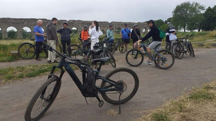 Rome: Appian Way E-Bike Tour Catacombs, Aqueducts & Picnic - Passing through the Caffarella Park and Egeria spring