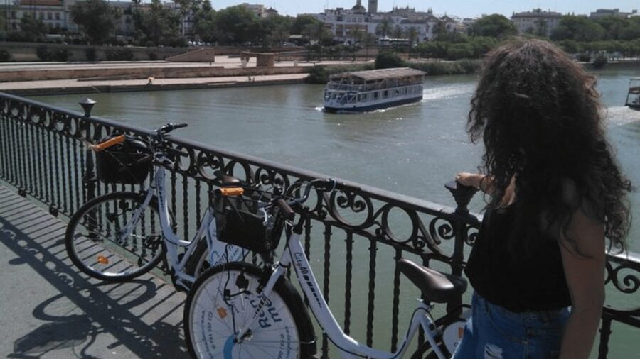 Seville City Bike Tour: Top Seville's Monuments - Crossing into Triana