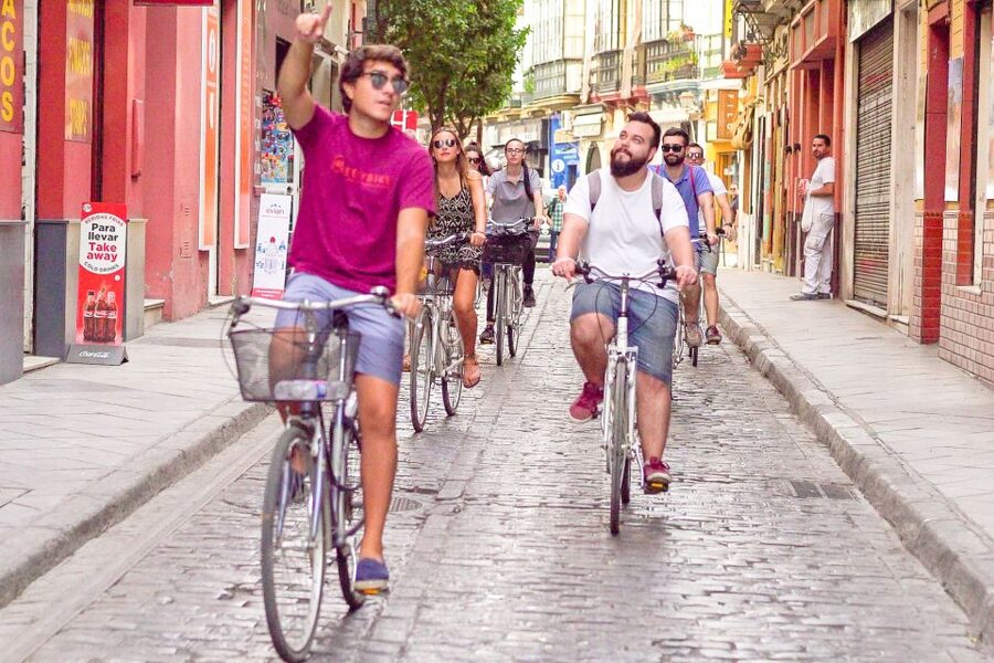 Seville: City Sightseeing and Local Culture Bike Tour - Triana and the Guadalquivir: Seville across the water