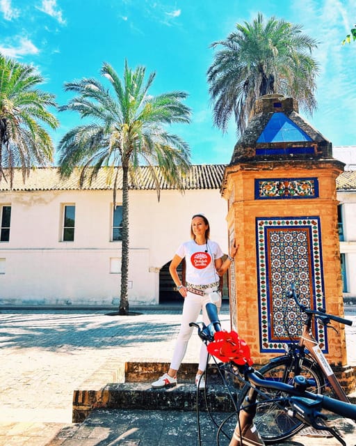 Seville: Dutch Cycling Highlights Tour with local guide - Crossing toward Triana