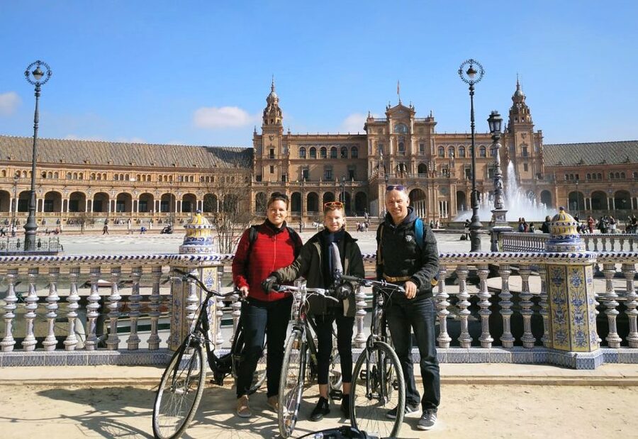 Seville: Highlights Bike Tour with Local Guide - San Telmo Palace and the shaded paths of María Luisa Park