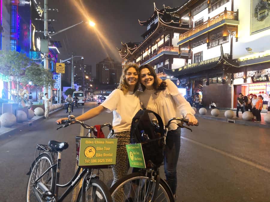 Shanghai: 4-Hour Nightlife Adventure & Tasting Bike Tour - Crossing between Pudong and The Bund