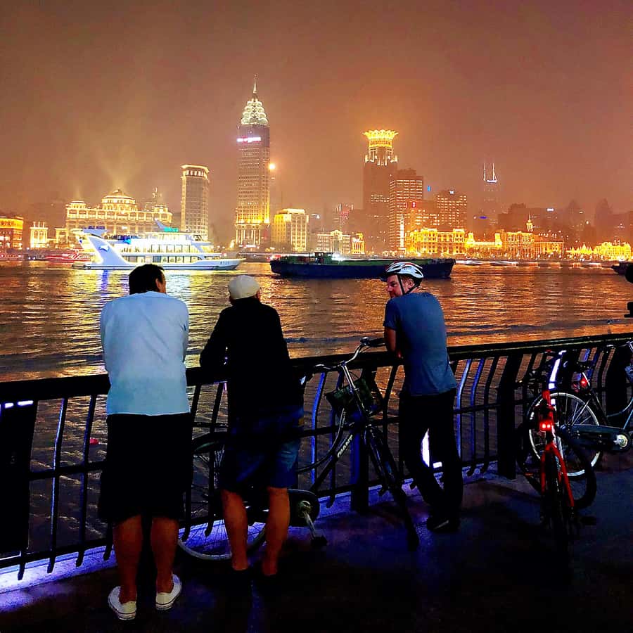 Shanghai Charming Night Small Group Bike Tour - What the guide adds to a short itinerary