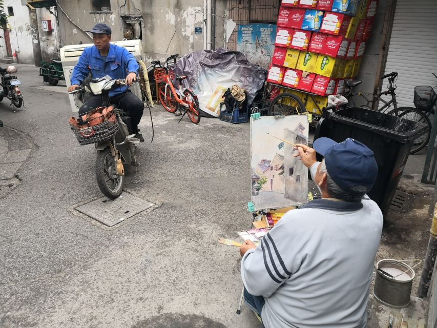 Shanghai: Full Day Classic Bike Tour With an Authentic Lunch - Xintiandi and Shanghai’s polished historic side