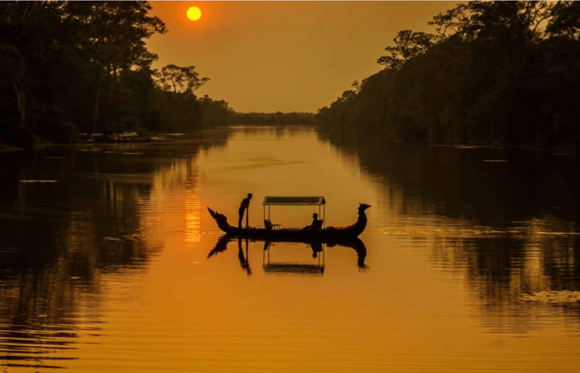 Siem Reap: Angkor Sunset Bike & Boat Tour /E-Bike Available - Entering Angkor Park by bike