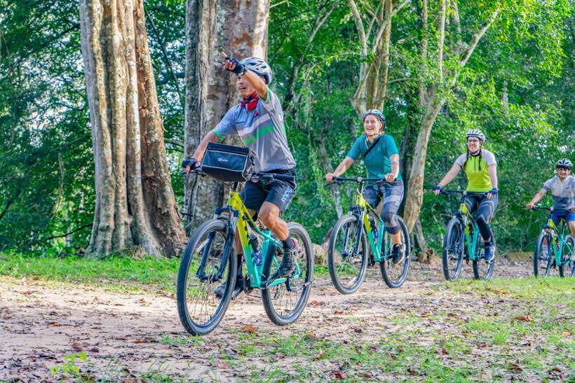 Siem Reap: Angkor Sunset Bike & Boat Tour /E-Bike Available - The Dragon Boat finish at the ancient waterway
