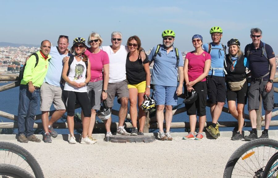 South Lisbon: 3-Hour Christ the King Electric Bike Tour - Returning across the river