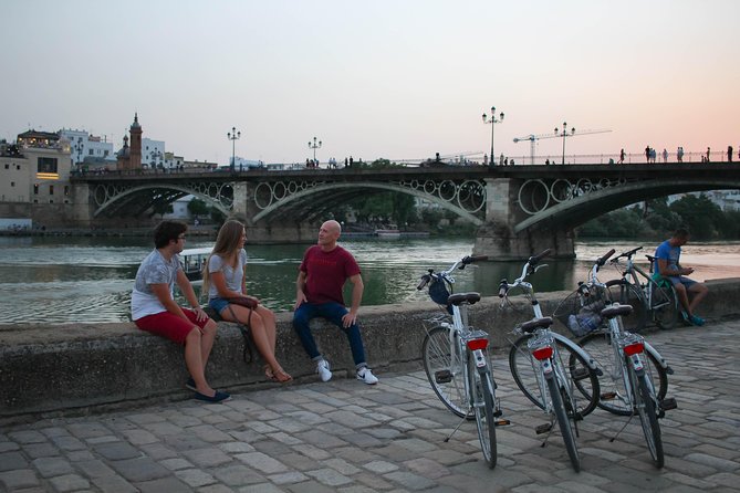 Sunset Guided Bike Tour in Seville - Palau de San Telmo and the former tobacco factory