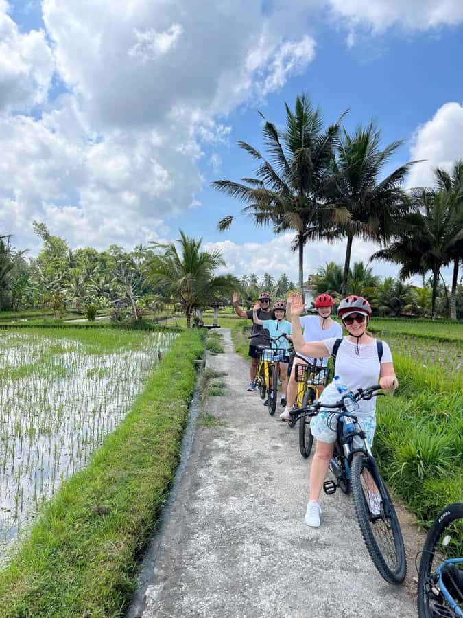 Ubud: E-Bike Tour with Rice Terrace and Village Visit - Tegalalang village and the Balinese family compound