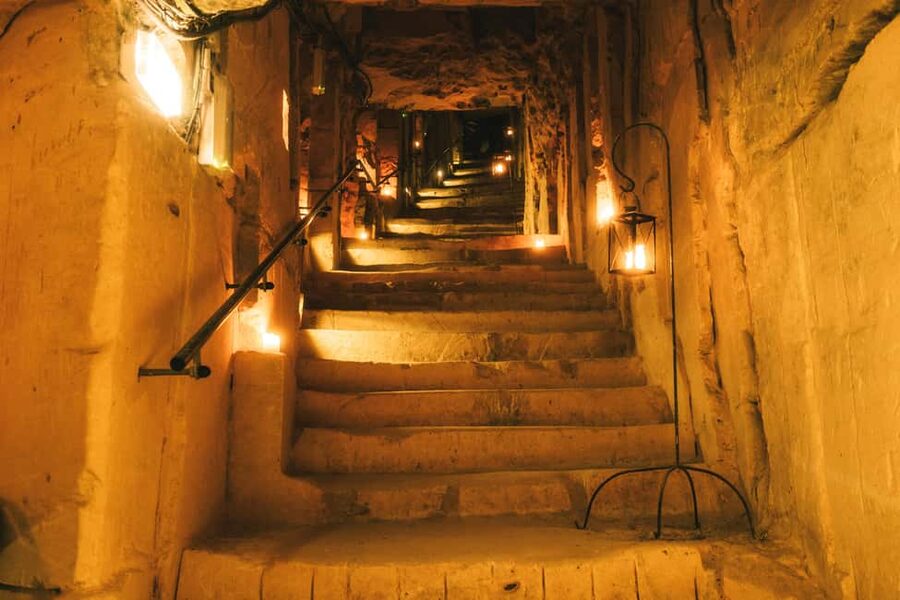 Valkenburg: Cave Biking Underground Bike Tour - The 163-step descent comes first