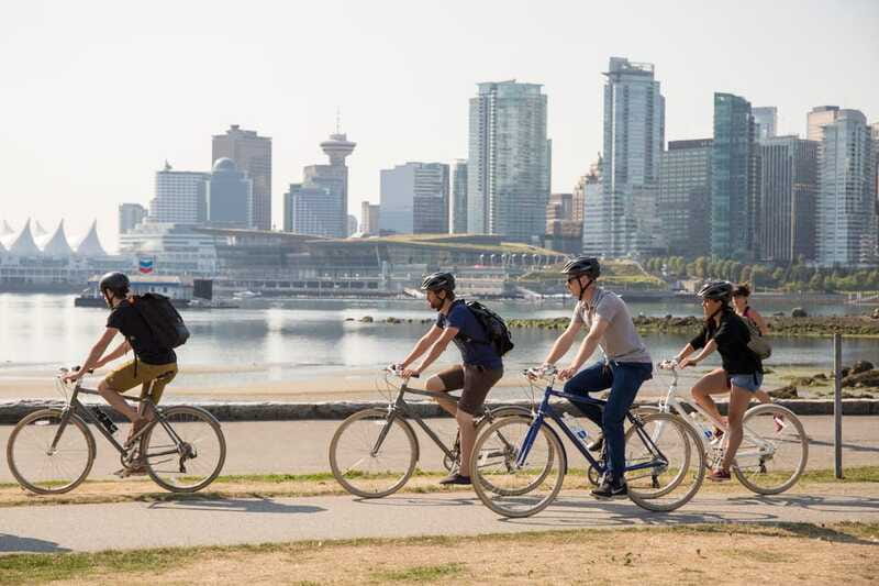 Vancouver: Guided Bike Tour - Returning through Coal Harbour