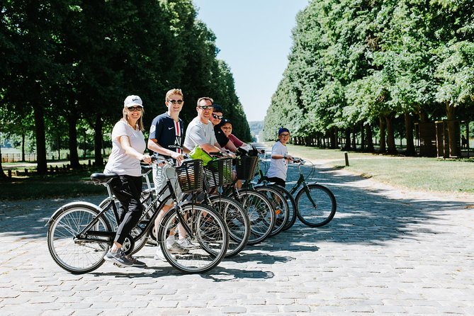 Versailles Domain Bike Tour with Palace Entry by Train from Paris - Buying lunch at the market
