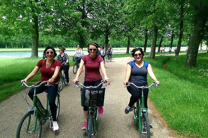 Versailles Domain Bike Tour with Palace Entry by Train from Paris - A picnic beside the Grand Canal